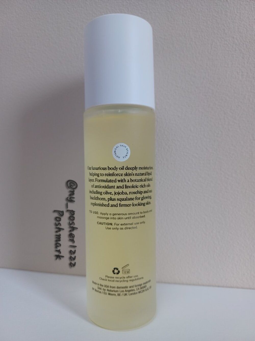 𝗡𝗔𝗧𝗨𝗥𝗜𝗨𝗠 𝐓𝐡𝐞 𝐆𝐥𝐨𝐰 𝐆𝐞𝐭𝐭𝐞𝐫 𝐁𝐨𝐝𝐲 𝐎𝐢𝐥 3.4 fl oz/100 ml🟡 - Picture 9 of 16